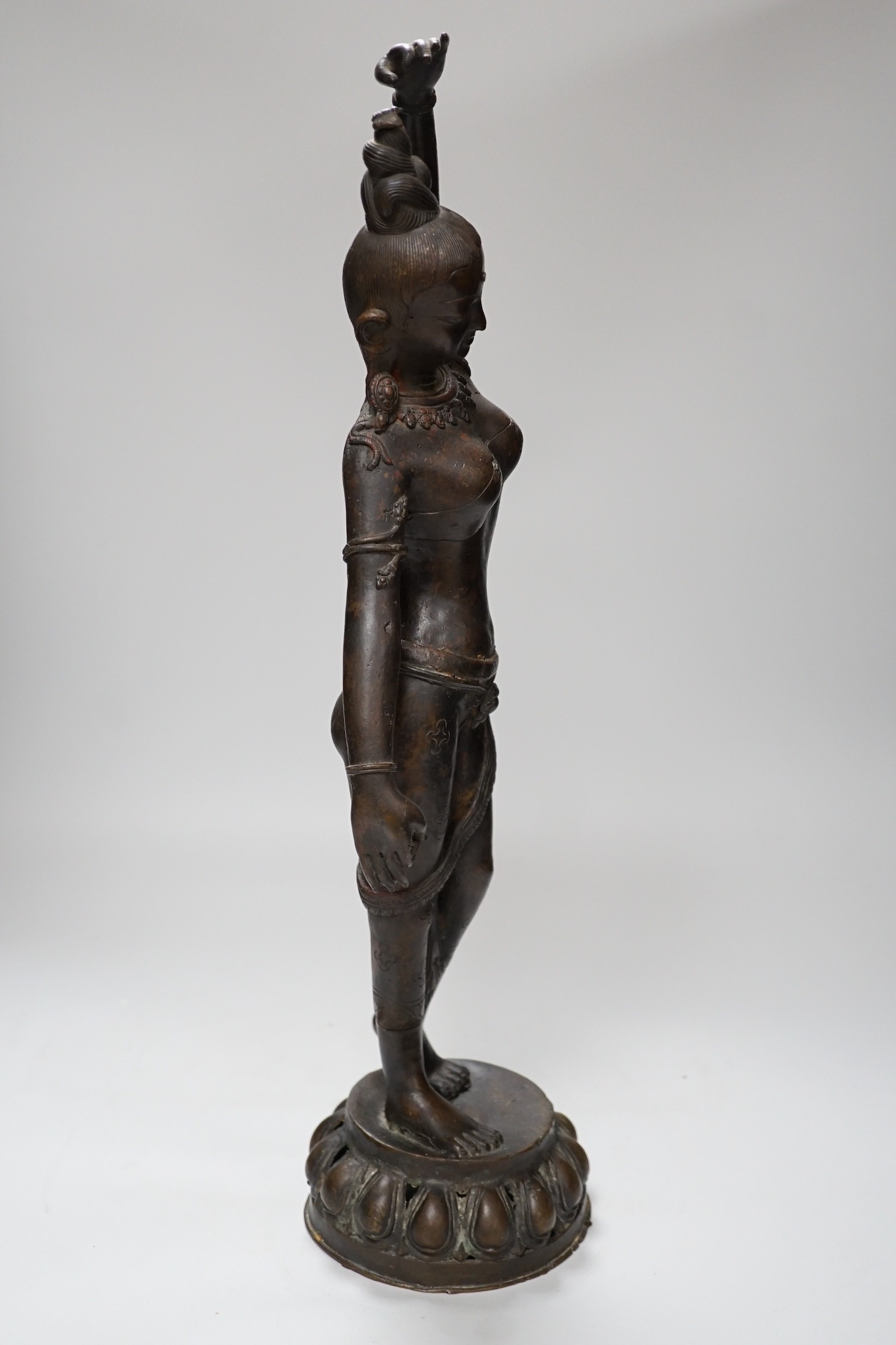 An Indian bronze figure of Parvati. 53cm tall